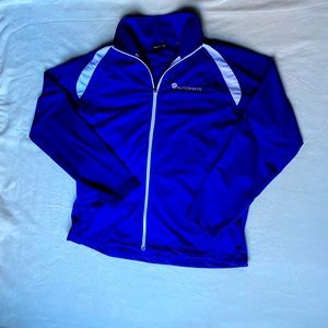 Sport-Tek blue zip up jacket with white accent